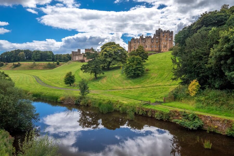 Alnwick Castle and Scottish Borders Tour from Edinburgh - Bamburgh: beach time beneath a 5th-century castle