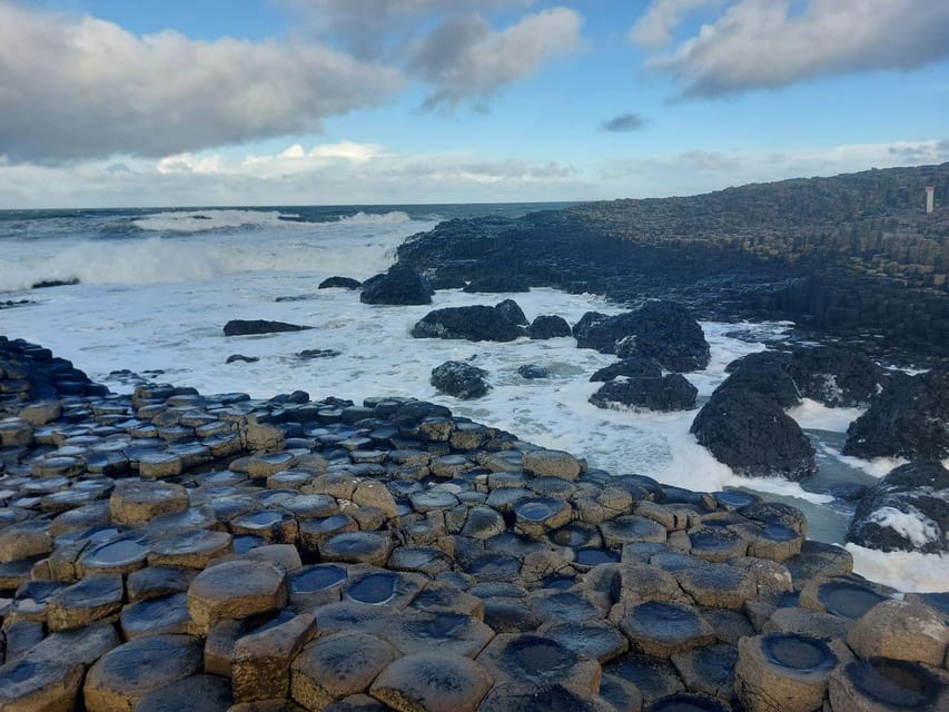 From Dublin: Giants Causeway Private Tour - Dunluce Castle from the coastal road