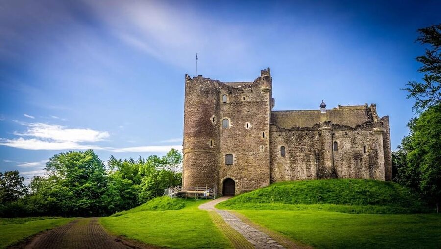 From Edinburgh: Highland Hike, Loch Paddle, and Castles - Meeting three Highland coos at a local farm