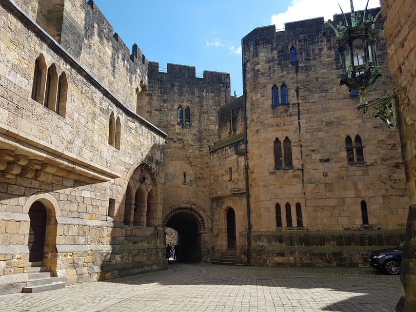 From Edinburgh: Holy Island, Alnwick Castle & Northumbria - Crossing the causeway to Holy Island