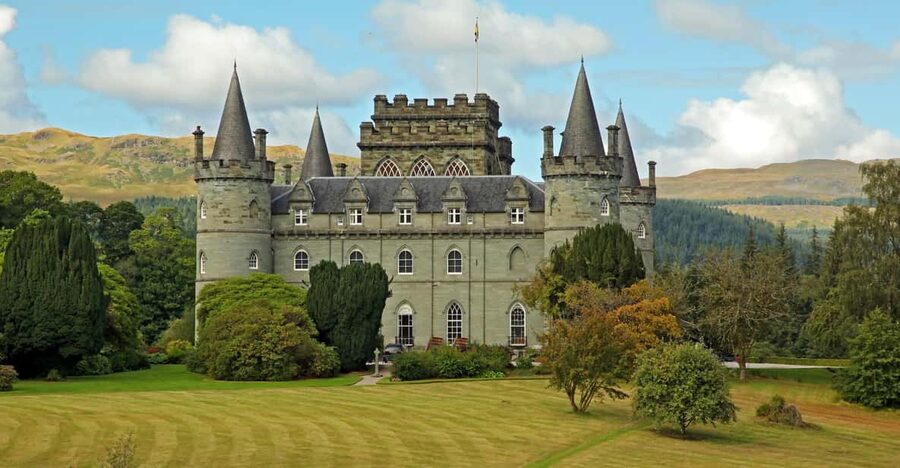 From Glasgow; Loch Lomond and Highlands Private Day Tour - Luss: cottages, a pier, and an old graveyard