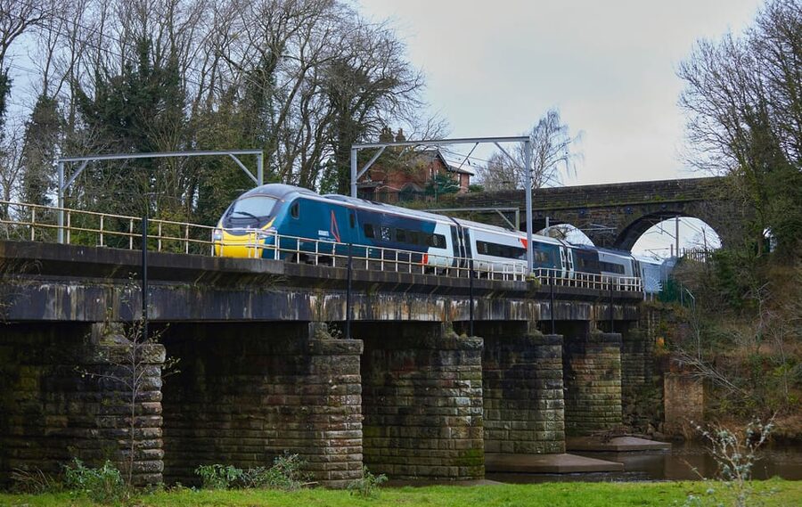 From London: North Wales, Snowdonia & Caernarfon Castle Tour - Meeting your guide in Manchester