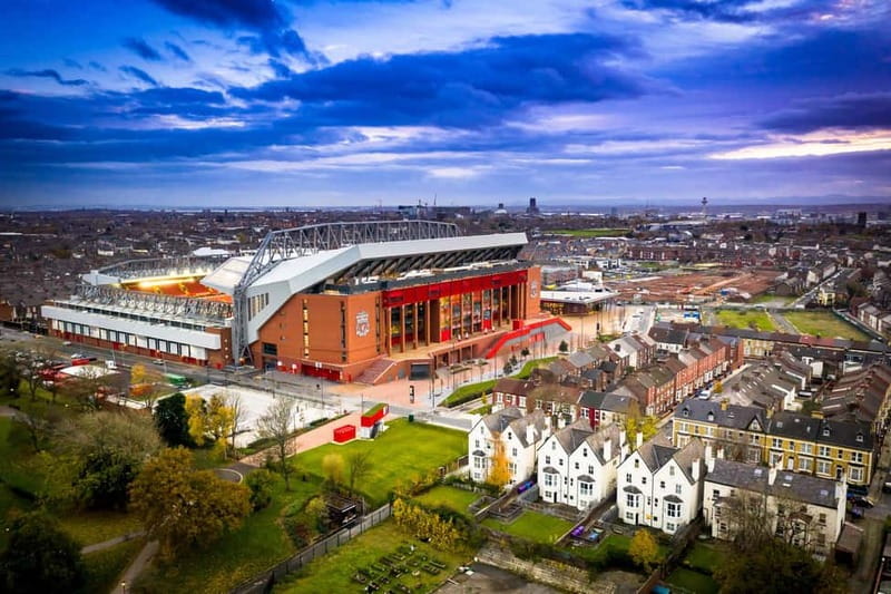 Liverpool: Liverpool Football Club Museum and Stadium Tour - Walking past the press room and dugouts