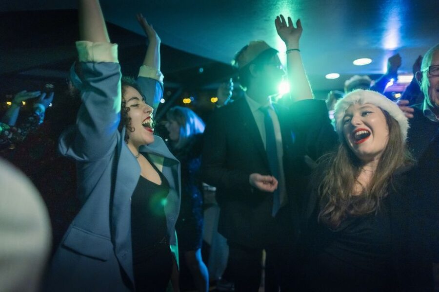 London: Christmas Party Dinner Cruise - The heated saloon and shared tables