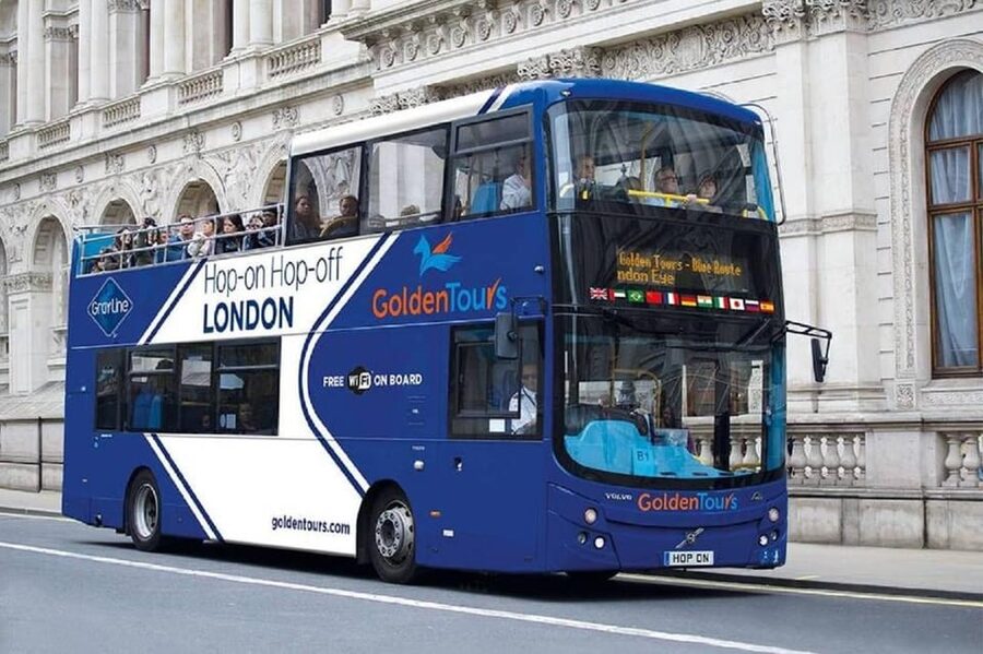 London: Hop-on Hop-off Bus Tour and Madame Tussauds Ticket - Taking the Thames boat between Westminster and the Tower