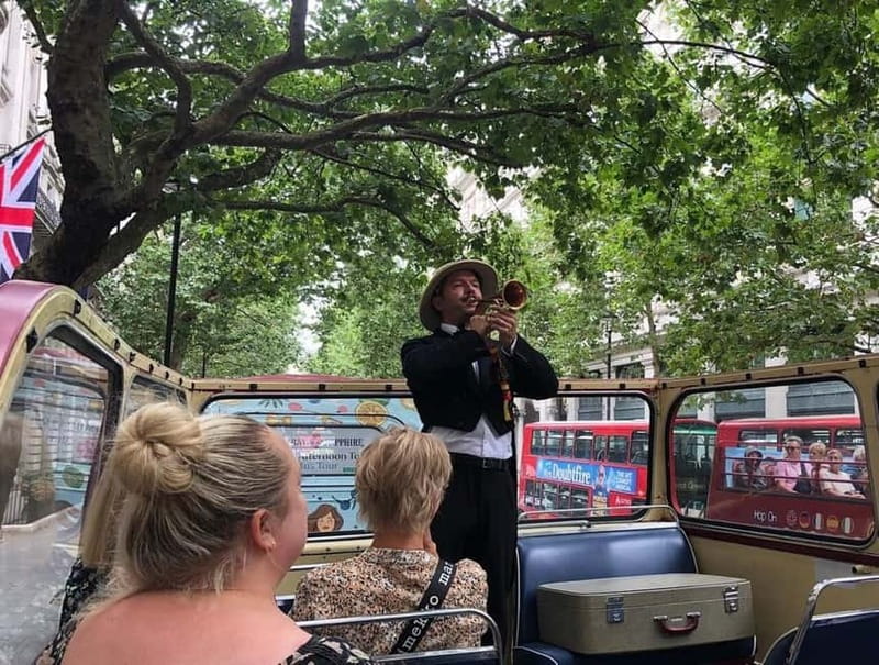 London Vintage Bus Tour: Live Comedy Sightseeing Show - Open-top views, rain, and seating realities