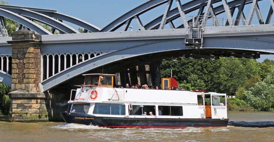 London: Westminster to Kew River Thames Cruise - Wandsworth and Putney show the river at a quieter pace