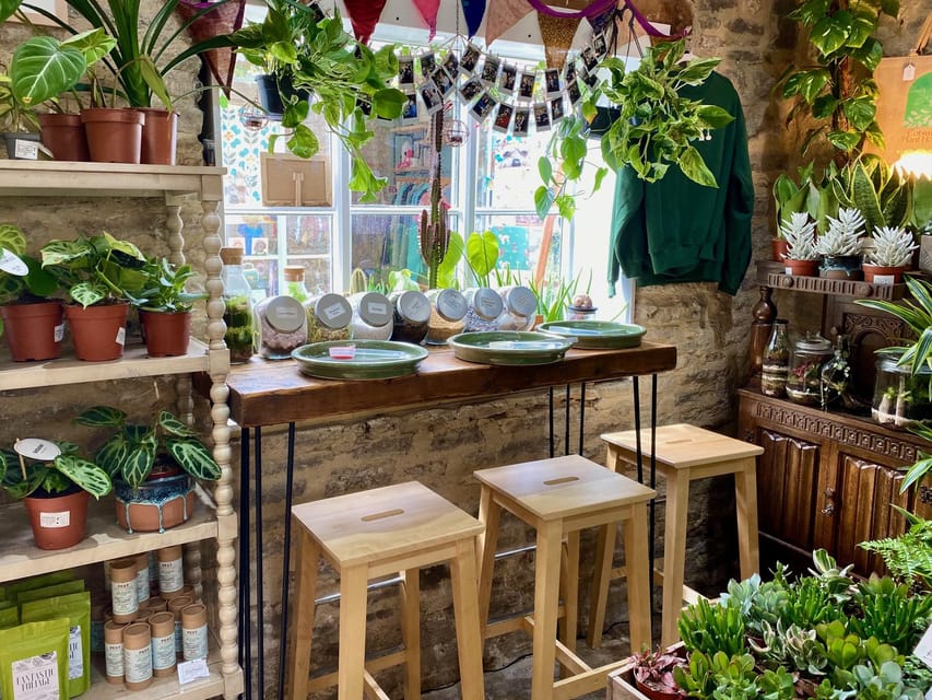 Make Your Own Terrarium in a houseplant paradise - The satisfying work of building each layer