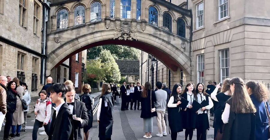 Oxford: City & University Tour with College entry included - The Covered Market and Broad Street finish