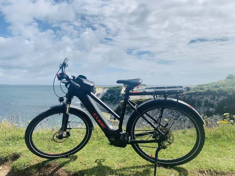 Poole: Old Harry Rocks and Corfé Castle Guided E-bike Tour - Studland Village Hall and the choice of Corfe Castle